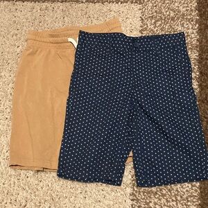 Joe 2 pair of shorts. One casual and one dressy. Both size 7/8